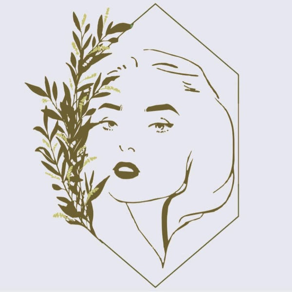 Outline of a face with floral elements on a light gray background