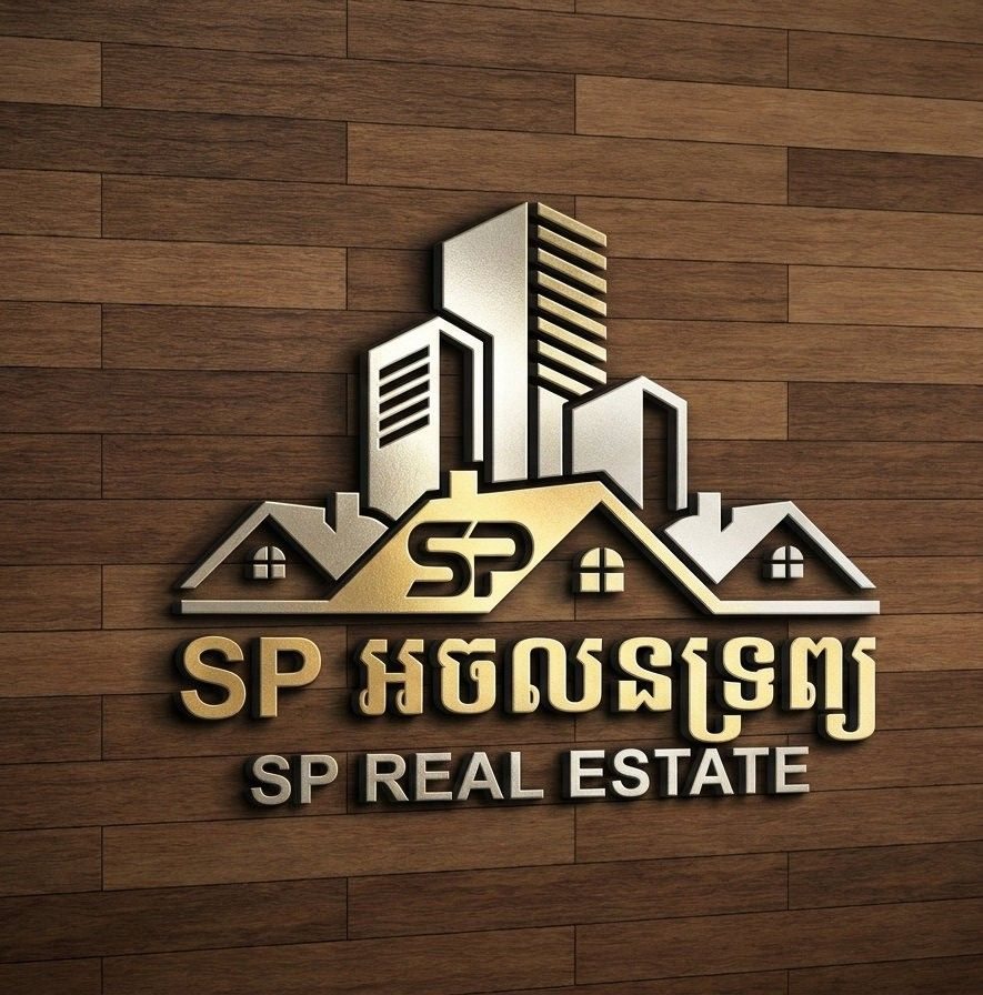 SP Real Estate logo on a wooden background