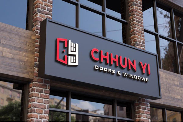 Chhun Yi Doors & Windows sign on a brick building