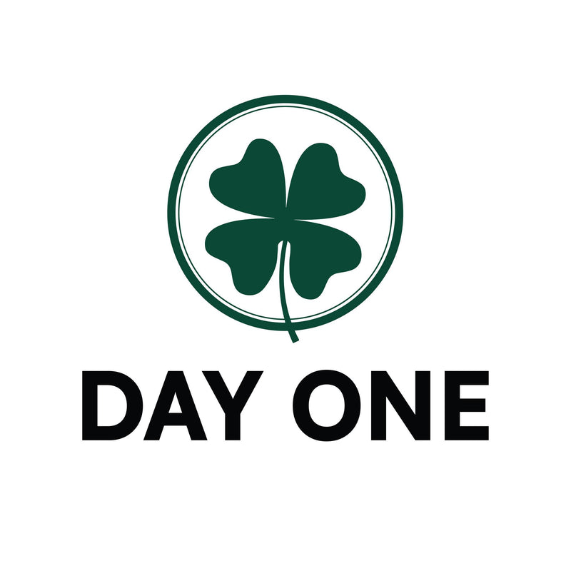 Logo with a four-leaf clover and 'Day One' text on a white background