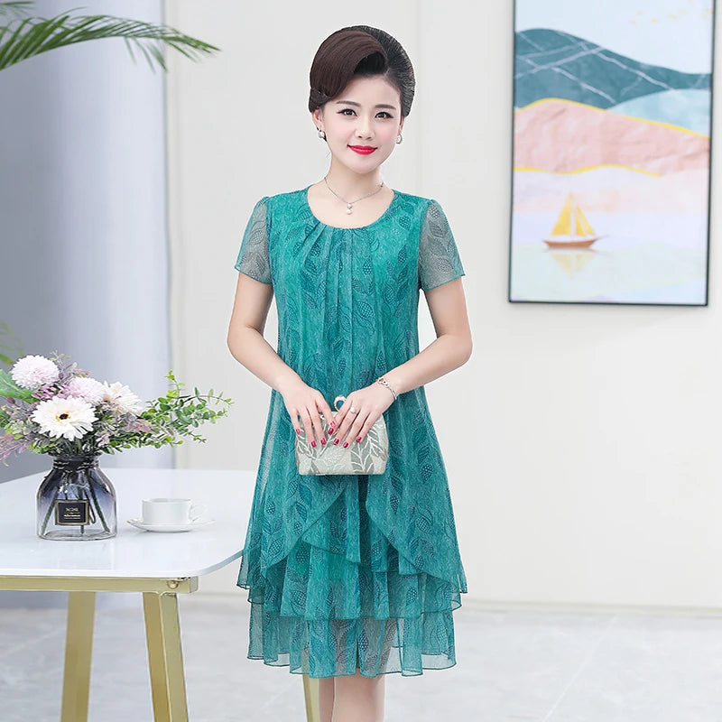 រ៉ូបរដូវក្តៅថ្មី រ៉ូបដៃខ្លីធម្មតា កអាវរាងអក្សរ O រ៉ូបបោះពុម្ពផ្កា រ៉ូបពិធីជប់លៀងឆើតឆាយ ទំហំ 5XL សម្លៀកបំពាក់ស្ត្រី