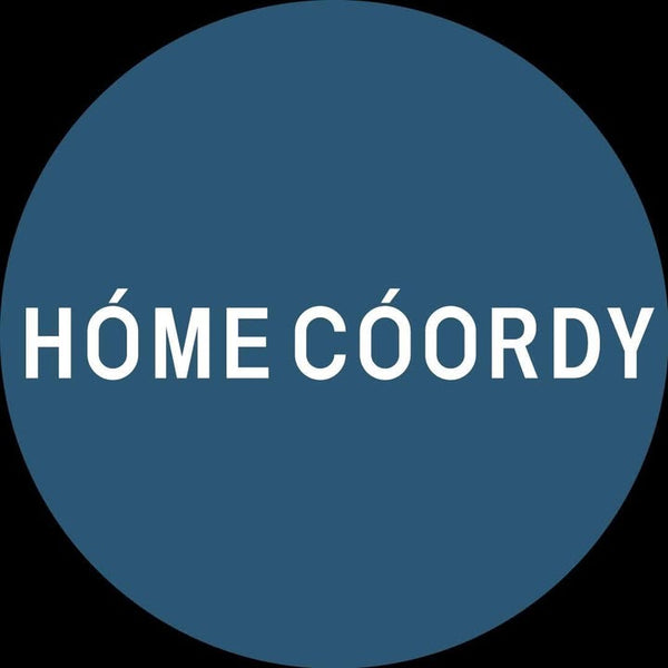Blue circle with 'HôME CóORDY' text in white