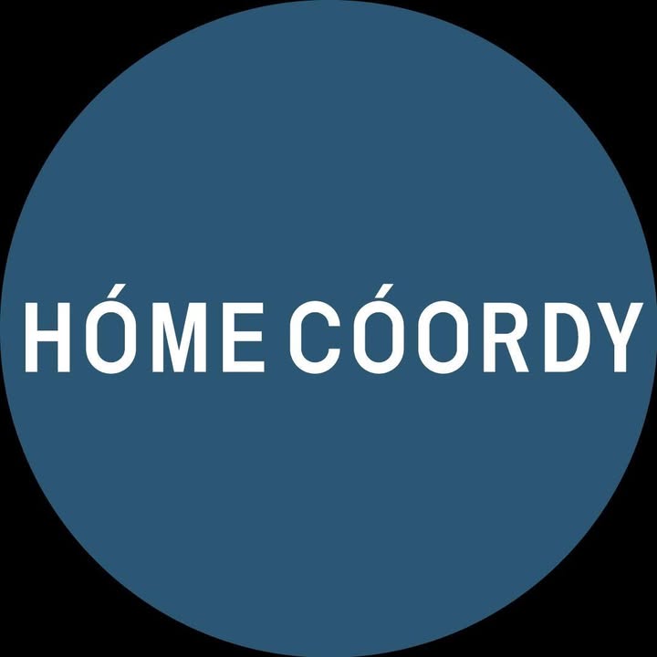Blue circle with 'HôME CóORDY' text in white