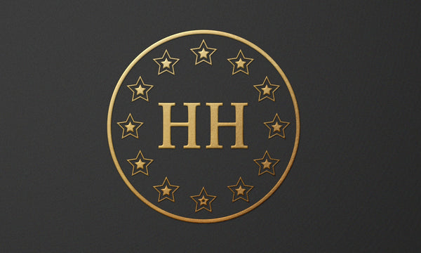 Gold emblem with 'HH' and stars on a black background