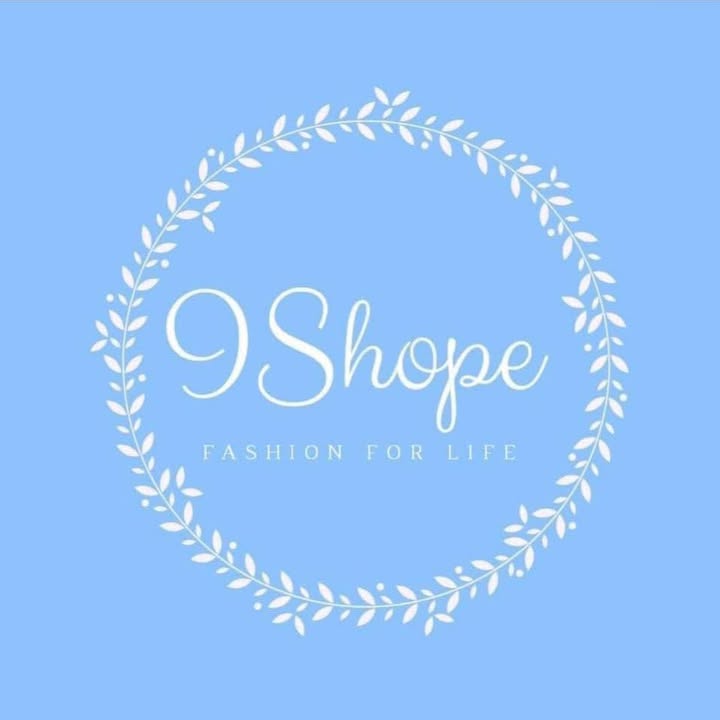IShope logo with floral wreath on a light blue background