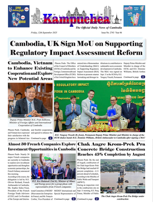 Newspaper front page with headlines about Cambodia and UK regulatory impact assessment reform.