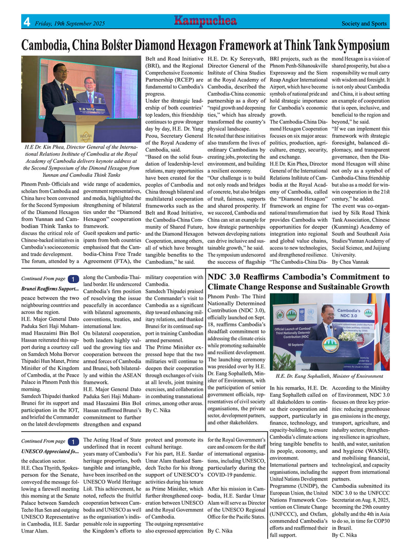 Newspaper article with text and images of a man at a podium and a flag.