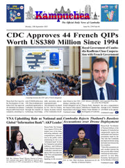 Newspaper front page with headlines about French OIPs and Cambodia's relations with France.