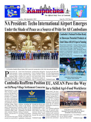 Newspaper front page with a large photograph of a statue and a group of people, with text about Cambodia and its President.