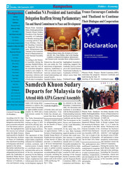 Newspaper page with international news headlines and images