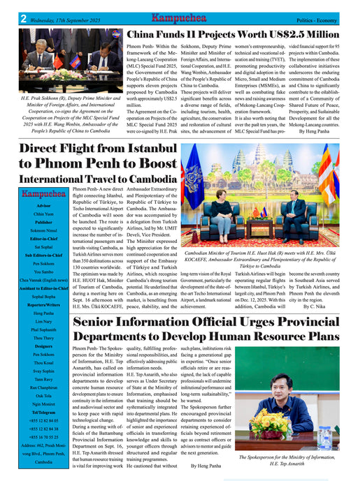 Newspaper page with various articles and images, including a photo of people sitting on a bench with flags in the background.