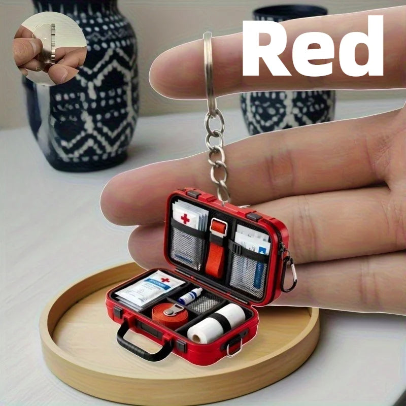 1pc 2D Flat Proportional First Aid Kit Keychain,Compact and Portable Care with CPR Guide Symbols,Bandage and Patch Compatible.