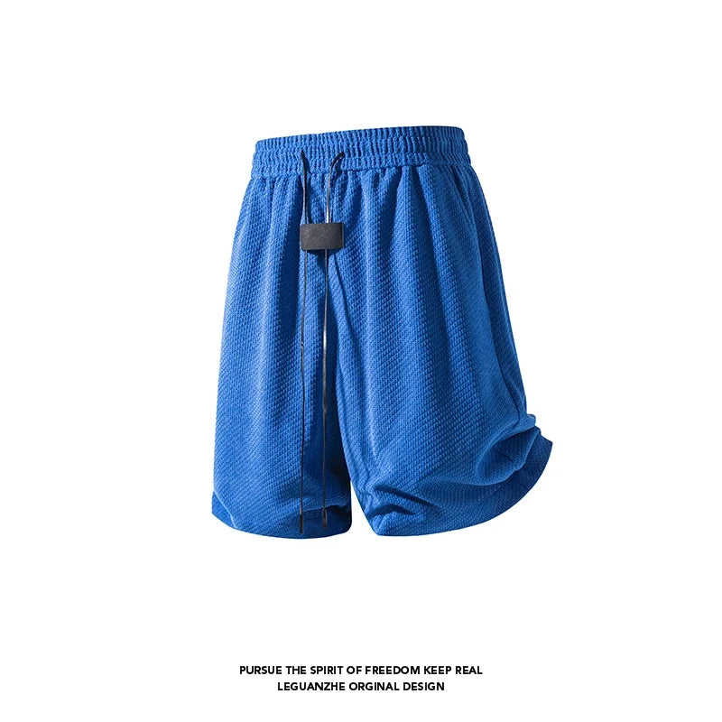 Male Summer Streetwear Shorts Waffle Textured Fabric Elastic Waist Long Drawstring Curved Hem Relaxed Cut For Outings