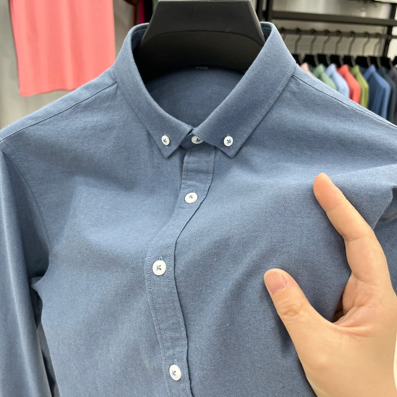 High-quality men's long-sleeve shirt made of 100% cotton, breathable, sweat-wicking, suitable for business or casual wear.M-4XL