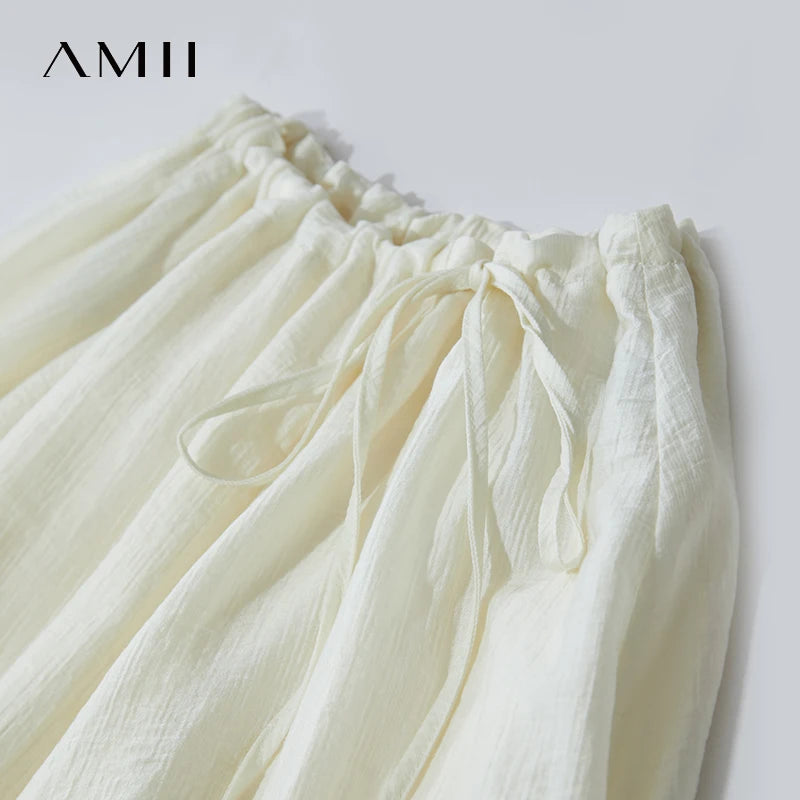 សំពត់ Amii ថ្មី Minimalist ប្រវែងជង្គង់ A-Line សម្រាប់នារី ស្លៀកជាមួយខ្សែចង ពណ៌រឹង អាចលៃតម្រូវបាន ស្ទីលធ្វើដំណើរ សំពត់រលុង 12522025