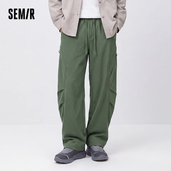 ខោបុរស Semir ធម្មតាមានស្រទាប់ក្រណាត់រោមចៀម រលុង សម ជើងកោង ពណ៌រឹង មានខ្សែចងសម្រាប់ពាក់ក្រៅផ្ទះ រដូវរងាថ្មី ឆ្នាំ២០២៦ សម្រាប់ពាក់ប្រចាំថ្ងៃ