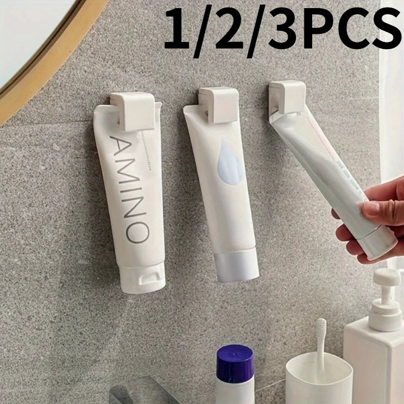 1/2/3pcs hole-free Wall-Mounted Toothpaste,Facial Cleanser Holder Clip,Multi-Functional Bathroom Storage Organizer. bathroom