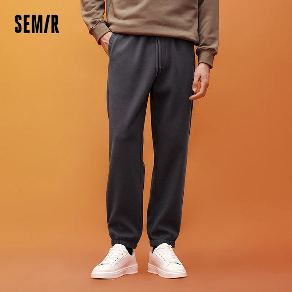 ខោបុរស Semir ធម្មតា មានស្រទាប់ក្រណាត់រោមចៀម រាងរលុង ជើងស្ដើង រចនាប័ទ្មសម្រាប់ធ្វើដំណើរ អាចពាក់បានច្រើនយ៉ាង រដូវរងាថ្មី ឆ្នាំ២០២៦ សម្រាប់ពាក់ប្រចាំថ្ងៃ