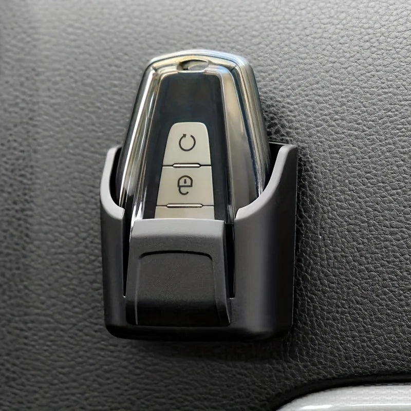 A Storage Box for Car Keys, Cards, And Remote Controls, Designed for The Dashboard And Console of Vehicles.