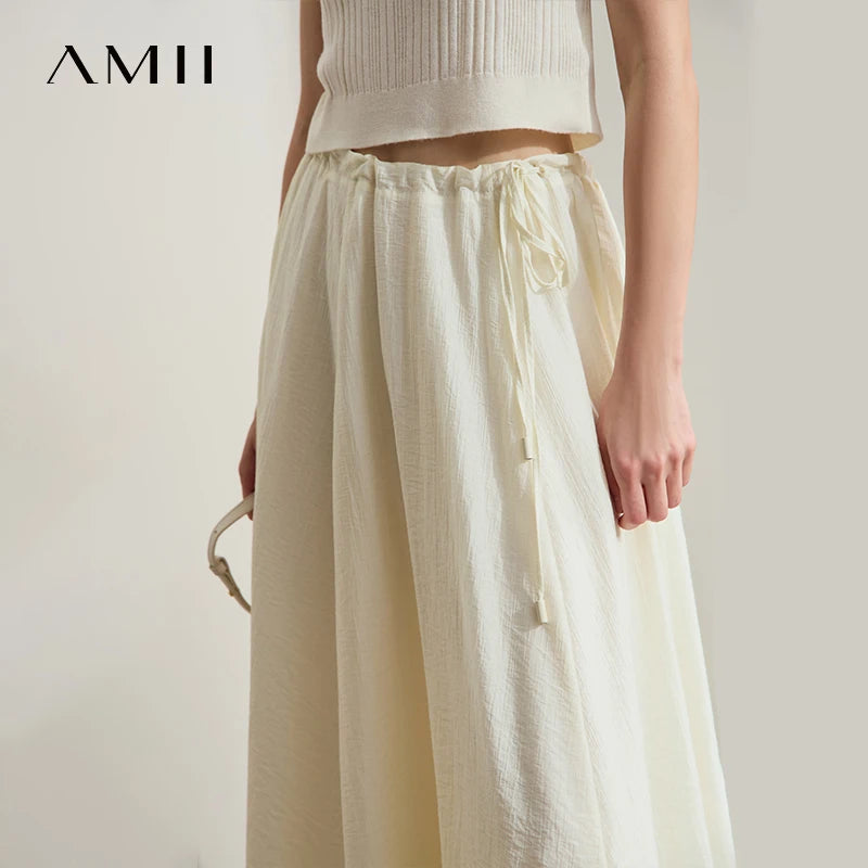 សំពត់ Amii ថ្មី Minimalist ប្រវែងជង្គង់ A-Line សម្រាប់នារី ស្លៀកជាមួយខ្សែចង ពណ៌រឹង អាចលៃតម្រូវបាន ស្ទីលធ្វើដំណើរ សំពត់រលុង 12522025