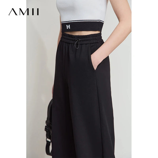 ខោ Amii Minimalist សម្រាប់នារីរដូវស្លឹកឈើជ្រុះឆ្នាំ ២០២៦ សម្លៀកបំពាក់ថ្មីរឹងមាំធម្មតាម៉ូដកូរ៉េចង្កេះយឺតកីឡាខោជើងធំ 12542035