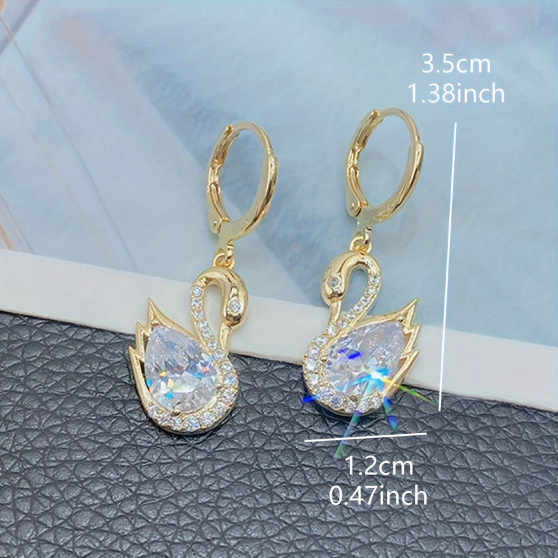 1 Pair of Luxurious Golden-Tone Swan Dangle Earrings with Sparkling Rhinestones - Elegant Zinc Alloy Fashion Jewelry for Women
