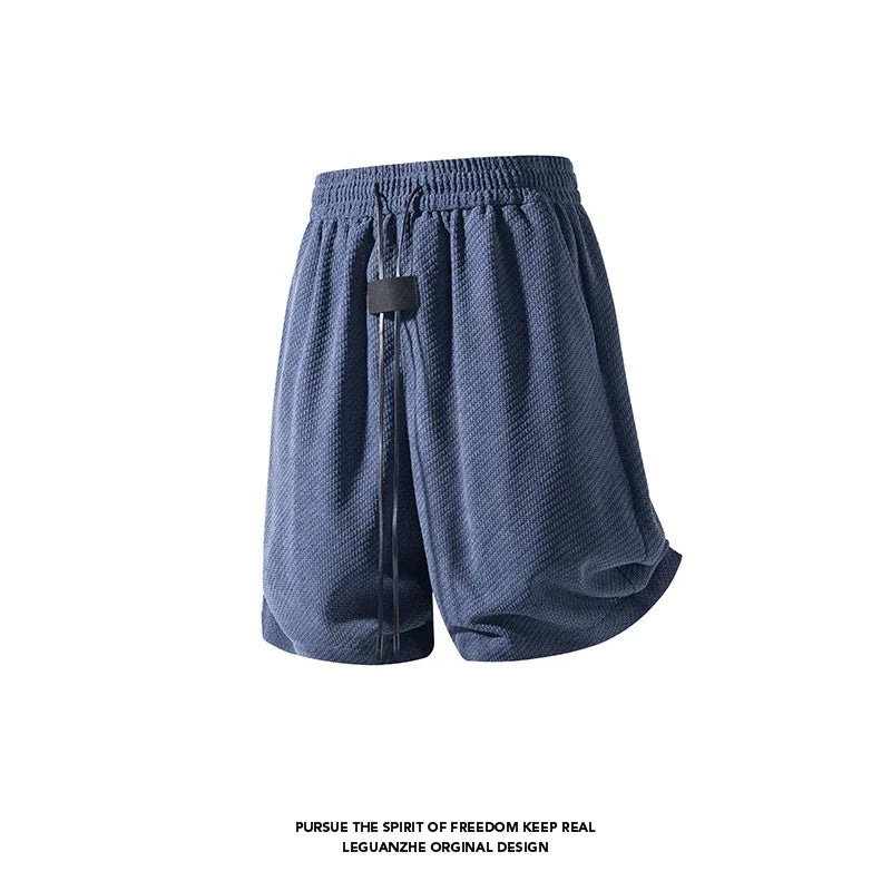 Male Summer Streetwear Shorts Waffle Textured Fabric Elastic Waist Long Drawstring Curved Hem Relaxed Cut For Outings