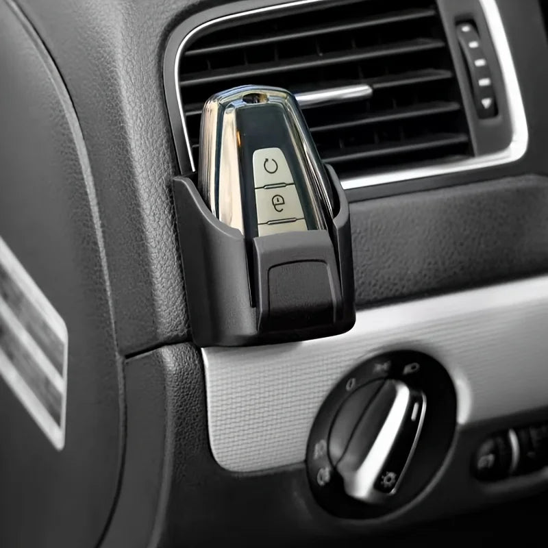 A Storage Box for Car Keys, Cards, And Remote Controls, Designed for The Dashboard And Console of Vehicles.