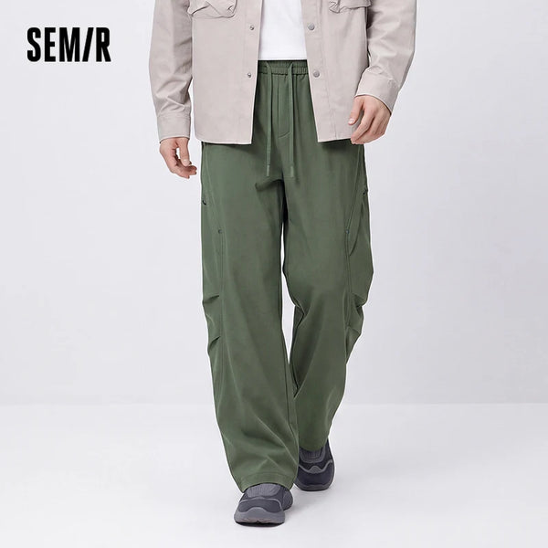 ខោបុរស Semir ធម្មតាមានស្រទាប់ក្រណាត់រោមចៀម រលុង សម ជើងកោង ពណ៌រឹង មានខ្សែចងសម្រាប់ពាក់ក្រៅផ្ទះ រដូវរងាថ្មី ឆ្នាំ២០២៦ សម្រាប់ពាក់ប្រចាំថ្ងៃ