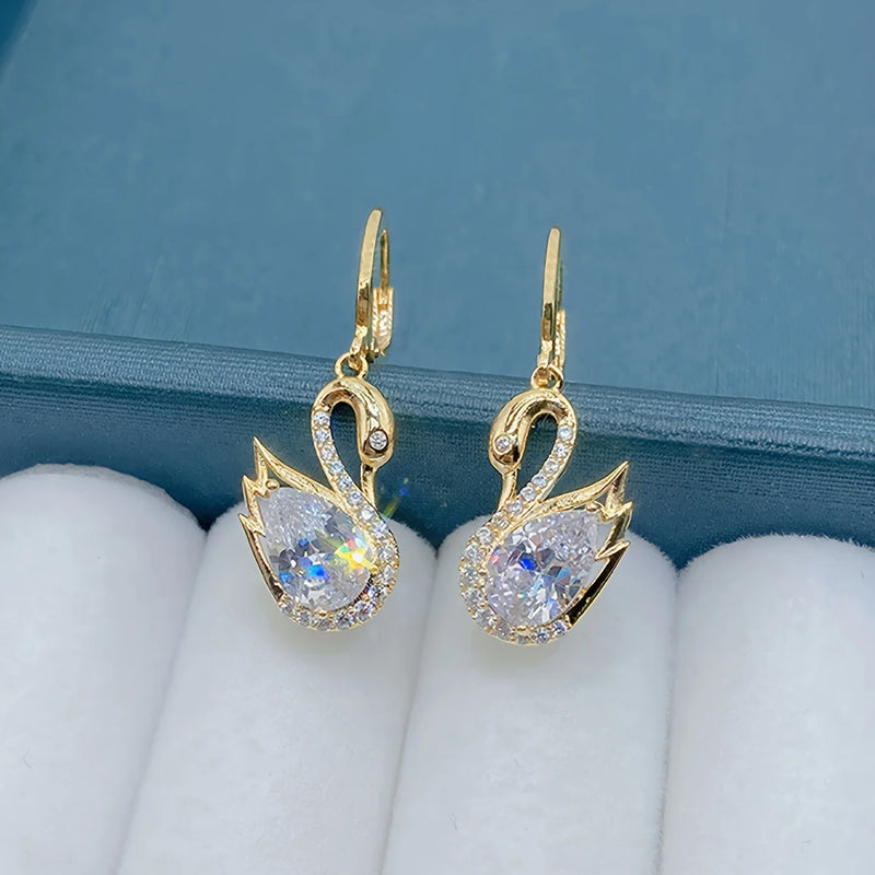 1 Pair of Luxurious Golden-Tone Swan Dangle Earrings with Sparkling Rhinestones - Elegant Zinc Alloy Fashion Jewelry for Women