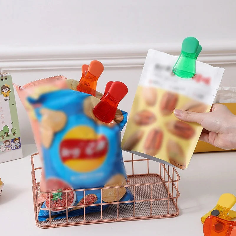 Set of 8 Magnetic Food Storage Clips - Airtight Kitchen Sealer for Snacks, Fresh-Keep & Moisture-Proof | ឈុតឃ្លីបម៉ាញ៉េទិចកៀបបិទមាត់ថង់រក្សាអាហារ ៨ គ្រាប់ - ឧបករណ៍កៀបបិទជិតការពារខ្យល់សម្រាប់អាហារសម្រន់ក្នុងផ្ទះបាយ រក្សាភាពស្រស់ និងការពារសំណើម