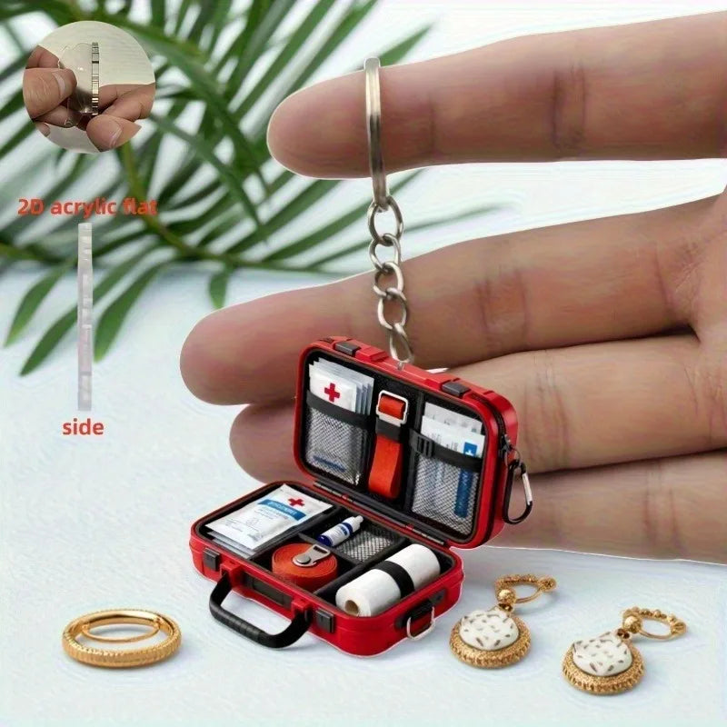 1pc 2D Flat Proportional First Aid Kit Keychain,Compact and Portable Care with CPR Guide Symbols,Bandage and Patch Compatible.