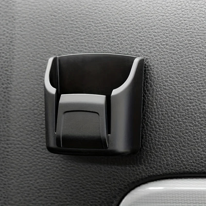 A Storage Box for Car Keys, Cards, And Remote Controls, Designed for The Dashboard And Console of Vehicles.