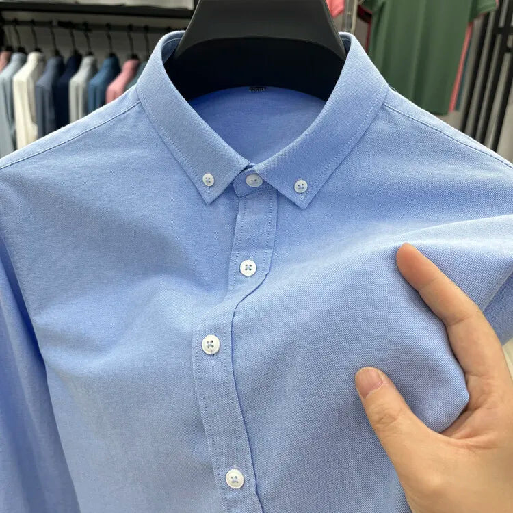 High-quality men's long-sleeve shirt made of 100% cotton, breathable, sweat-wicking, suitable for business or casual wear.M-4XL
