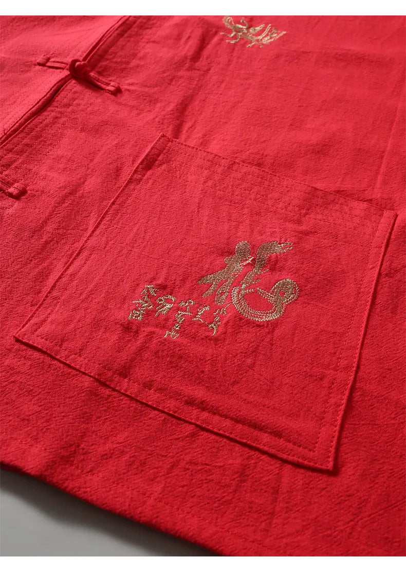 Men's Red Embroidered Two-piece Set for Summer, Featuring A Chinese-style Short-sleeve Shirt Paired with Ankle-length Pants.