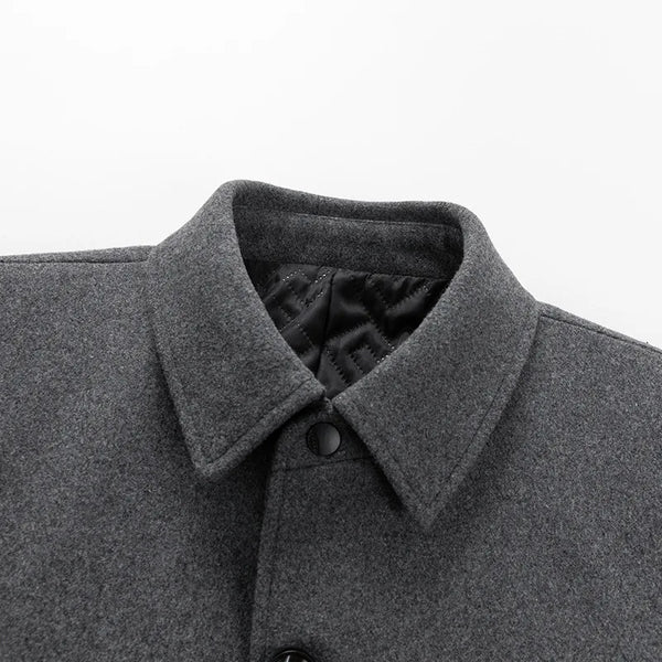 New Winter Men's Dark Gray Tweed Trench Coat—a Warm, Long Jacket with A Black Single-breasted Lapel.