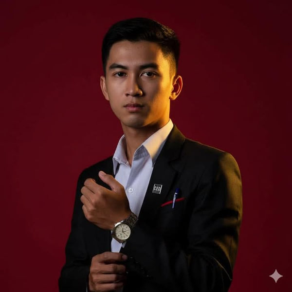 Man in a suit with a red background